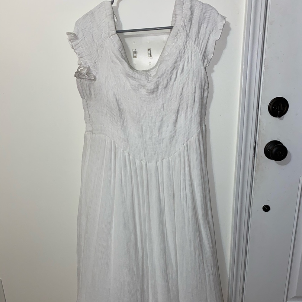 White off the shoulder dress.